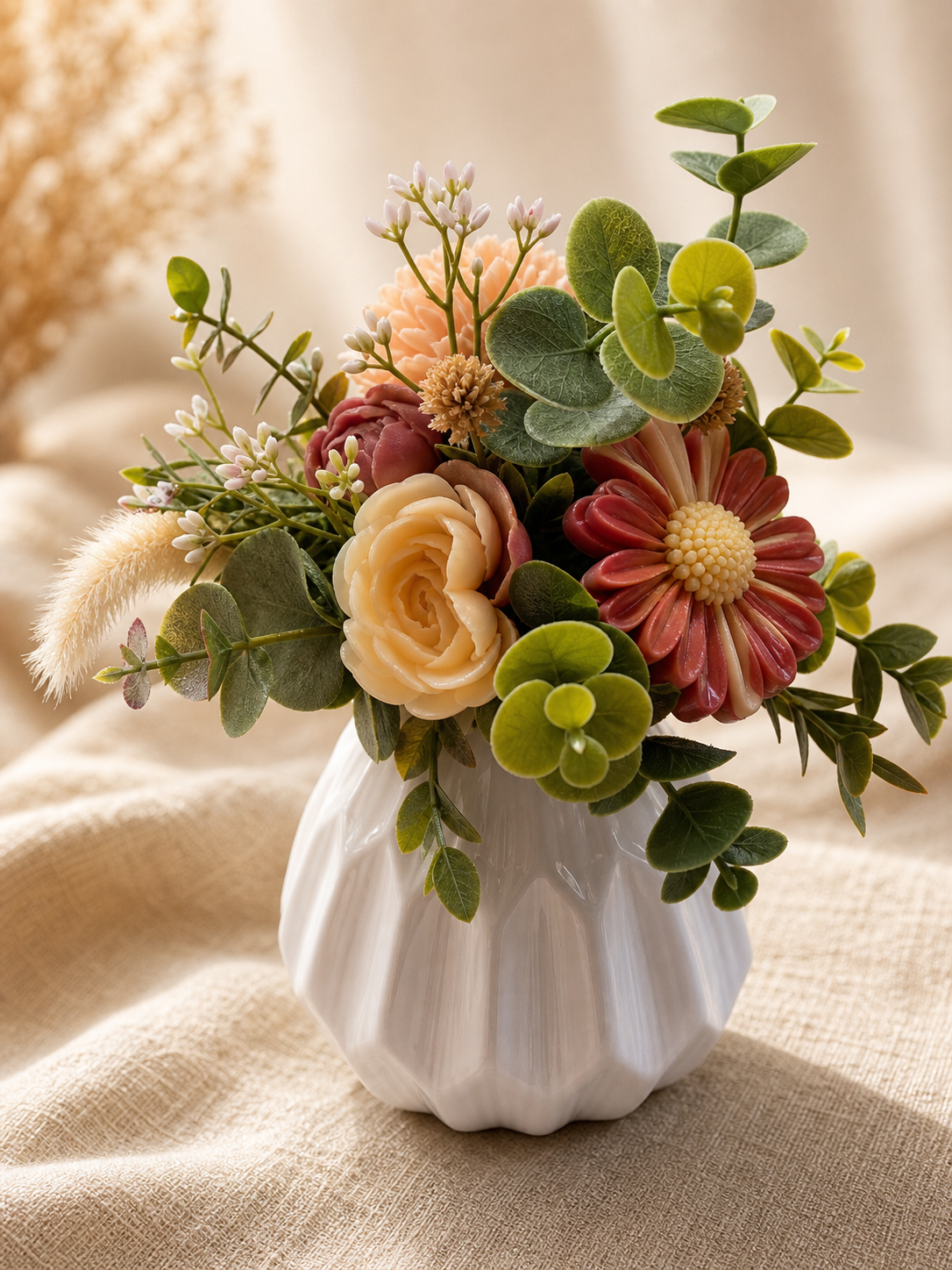 Warm cream peach and burgundy scented wax floral arrangement with daisy and greenery